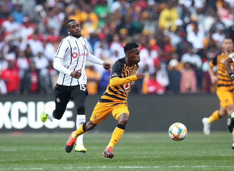 Kabelo Mahlasela of Kaizer Chiefs challenged by Fortune Makaringe of Orlando Pirates during the 2019 Carling Black Label Cup match between Kaizer Chiefs and orlando Pirates at the FNB Stadium, Johannesburg on the 27 July 2019.