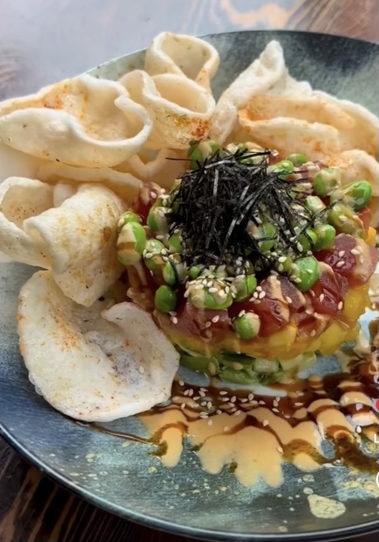 Tuna Poke served shrimp chips and tamari