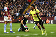 Lyle Foster celebrates scoring Burnley's second goal in the Premier League match against Aston Villa at Villa Park in Birmingham on Saturday.