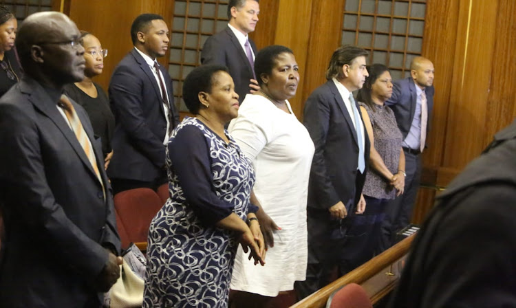 The accused in the Nulane Investments R24.9m fraud and money-laundering case, from left to right: Peter Thabethe, Limakatso Moorosi, Seipati Dhlamini, Iqbal Sharma, Ronica Ragavan and Dinesh Patel. File photo.