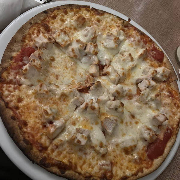 Gluten Free pizza with grilled chicken as a topping