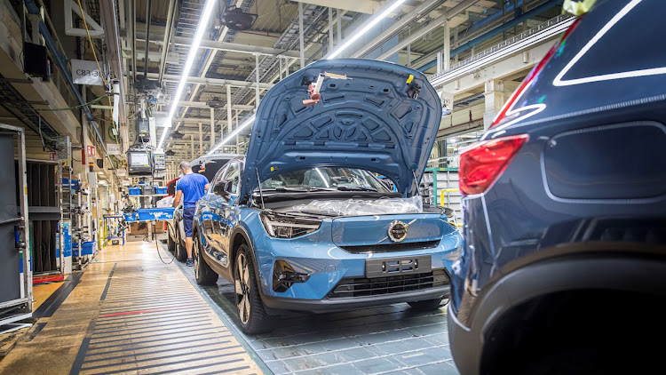 A Volvo C40 Recharge being assembled at the firm's production facility in Ghent, Belgium. Volvo Cars is considering building a third plant in Europe to boost its production capacity beyond 1.2 million vehicles per year.