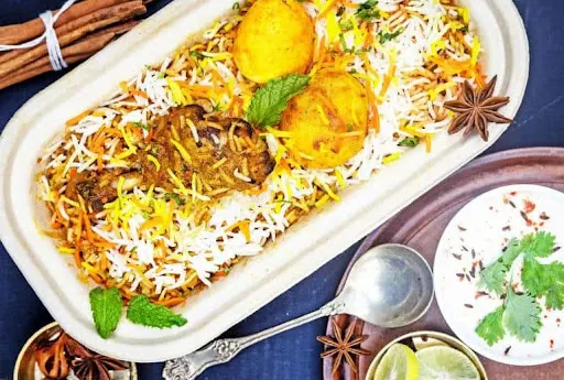 Kolkata Chicken Tangri Dum Biryani With Egg (Plate)