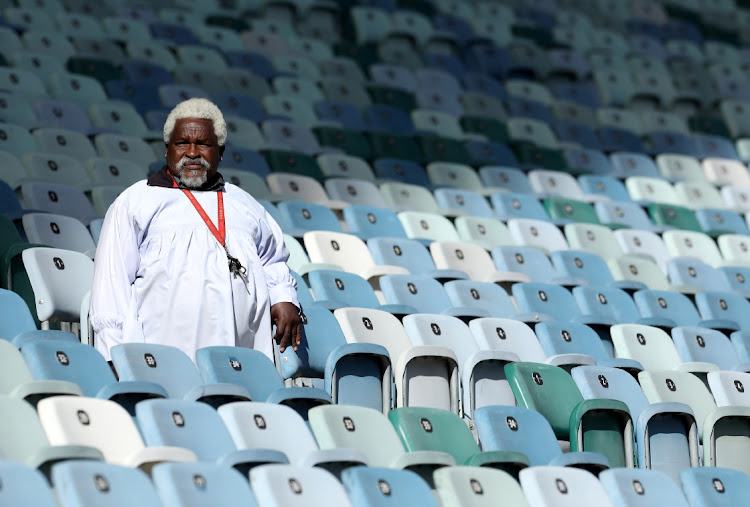 An elderly man kneels as Mduduzi Shembe arrives at Moses Mabhida Stadium in Durban on Thursday.