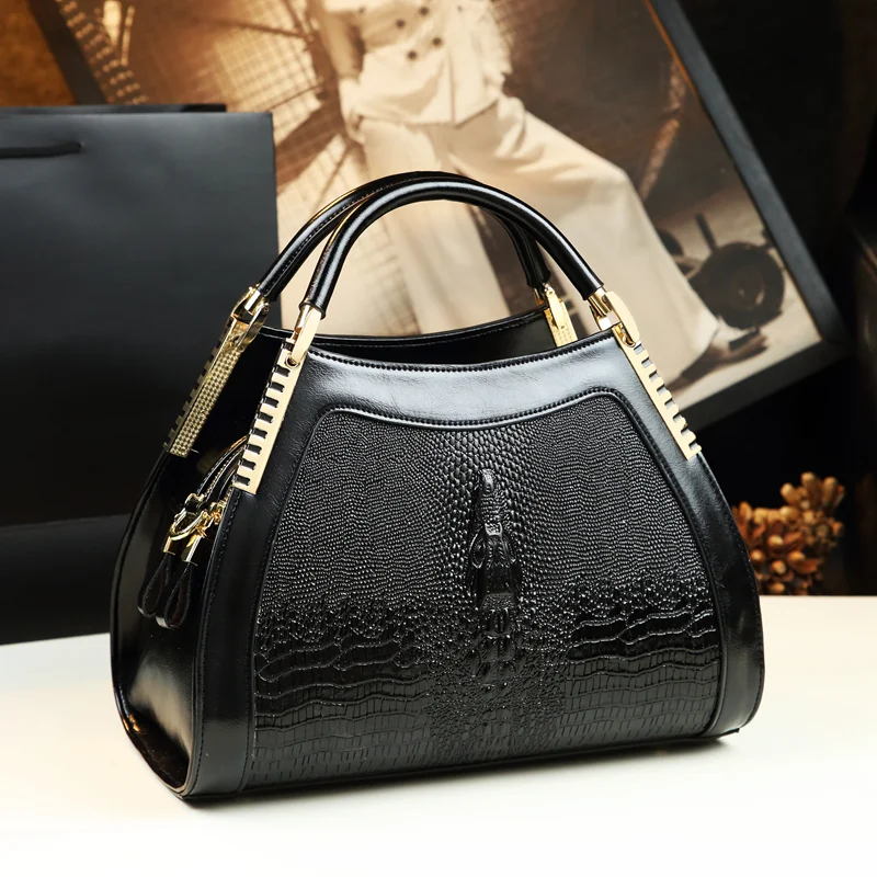 Bolsa Bag Ladies grande para ombro estilo mensageiro, ideal para mamães. Ampla, prática e com design estereotipado.