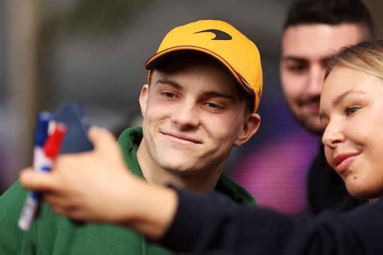 Oscar Piastri greets fans on the Melbourne Walk during previews before the F1 Grand Prix of Australia at Albert Park Grand Prix Circuit on March 30 2023 in Melbourne.