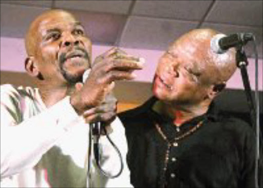 VETERANS: Ray Phiri and Nana Coyote Motijoana. Pic. Pat Seboko. 10/07/06. © Sowetan.