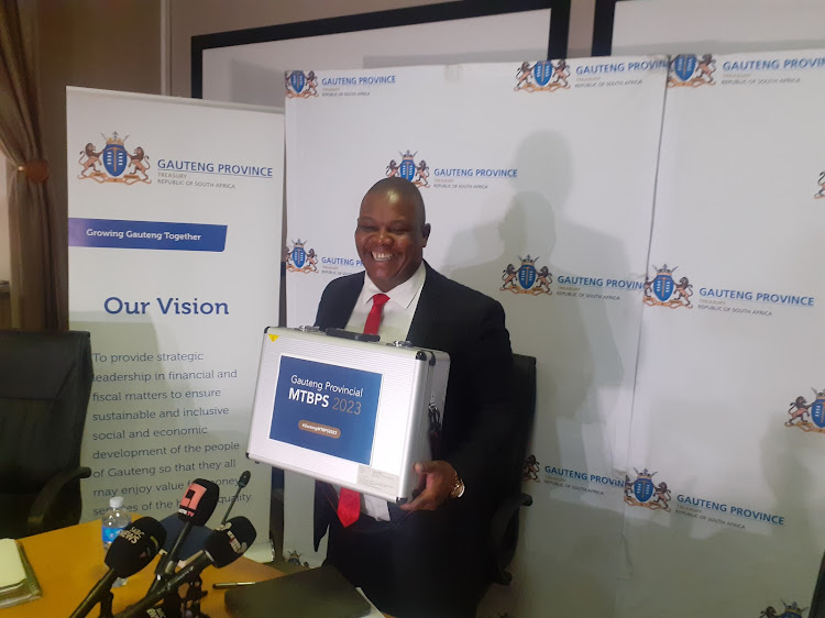 Gauteng finance MEC Jacob Mamabolo with the MTBPS documents during a briefing to the media before presenting the budget in the provincial legislature.