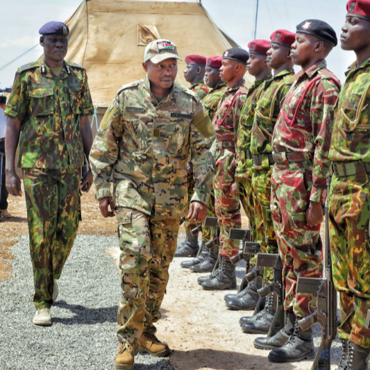 Interior CS Kindiki Kithure with officers during his tour of Lokichogio and Nadapal to access the security situation on January 27,2023.