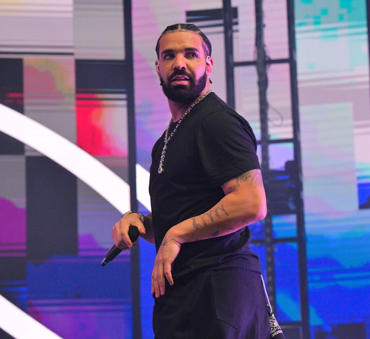 Rapper Drake performs on stage.