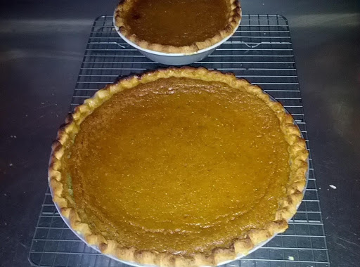 Pumpkin pie with a mini-pumpkin pie made with leftover ingredients.