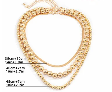 Collier femme multicouches en métal perlé, un bijou tendance et élégant pour sublimer vos tenues, idéal au quotidien ou en soirée.