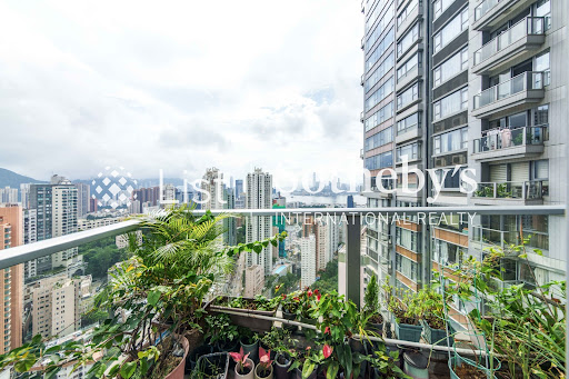 Urban view from flowered balcony in this luxury property for sale in Mid-Levels ($7,652,012)