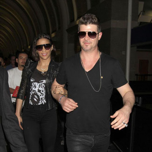 Paula Patton and Robin Thicke