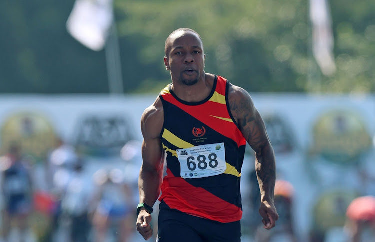 Akani Simbine leads the men's 100m semifinal at the 2024 ASA Senior Track and Field Championships at Msundunzi Athletics Stadium in Pietermaritzburg on Thursday.