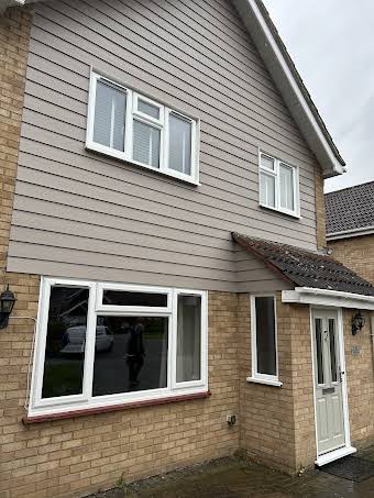 Marley weatherboards Liniar windows and solidor composite door album cover