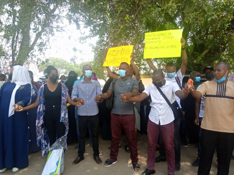 Mombasa Heath Workers protest salary delays on Wednesday.