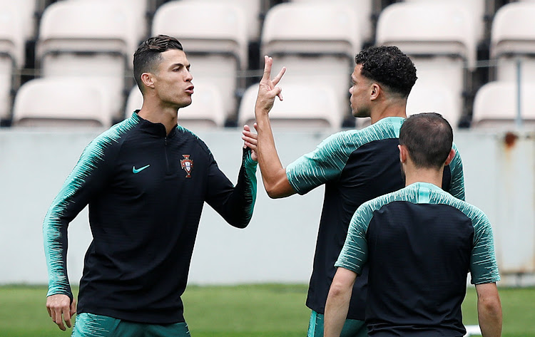 Portugal's Pepe and Cristiano Ronaldo during training