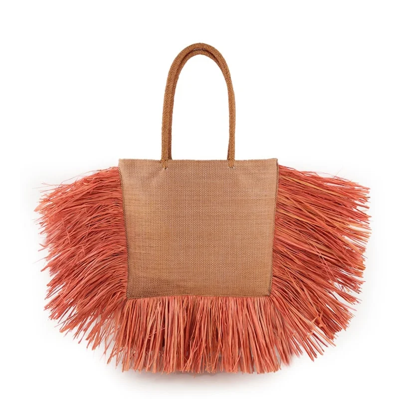 Summer raffia fringe bag, straw woven. The perfect beach bag, lightweight and stylish. Ideal for carrying your essential