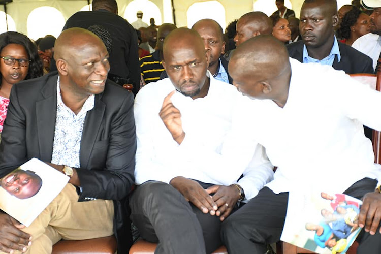 Energy CS Charles Keter, Elgeyo Marakwet Senator Kipchumba Murkomen and Kapseret MP Oscar Sudi at Kaporuso, Bomet East, during the funeral of Collins Kipyegon, son of area MP Beatrice Kones.