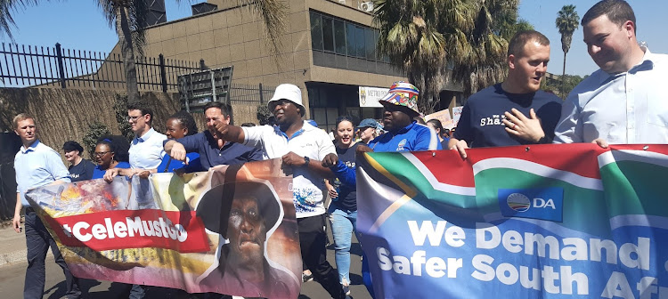 DA leader John Steenhuisen marches alongside DA Gauteng leader Solly Msimanga and other protestors in Pretoria calling for the resigantion of police minister Bheki Cele.