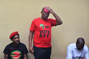 EFF leader Julius Malema wipes the sweat from his brow after a march by his supporters to the presidential compound to demand the resignation of President Cyril Ramaphosa as part of their national shutdown action.  