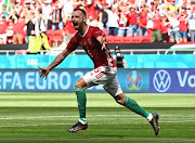 Attila Fiola of Hungary celebrates after scoring in their Uefa Euro 2020 Championship Group F match against France at Puskas Arena in Budapest, Hungary on June 19, 2021.
