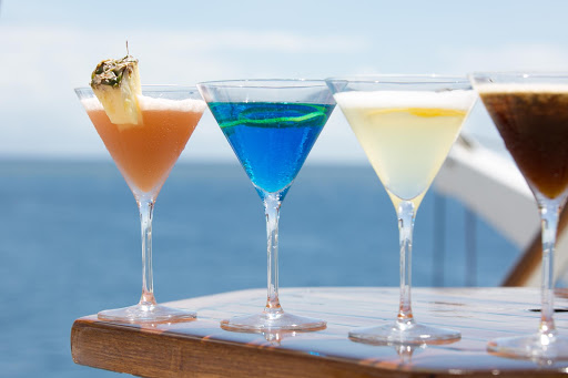 Enjoy a cocktail on deck on your next cruise. 