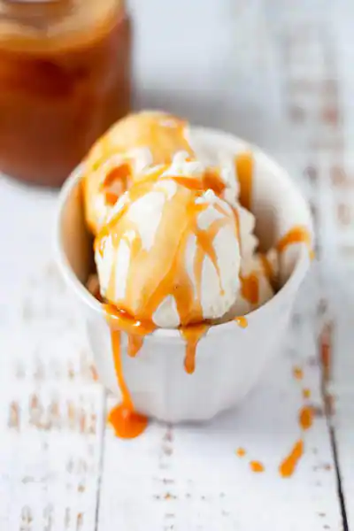 Vanillla Ice Cream Dipped In Caramel Sauce