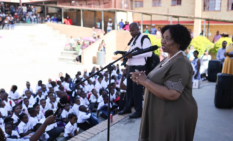 Basic education minister Angie Motshekga addresses parents and pupils on the first day of the school year on January 11 at Cosmo City Primary School in Johannesburg.