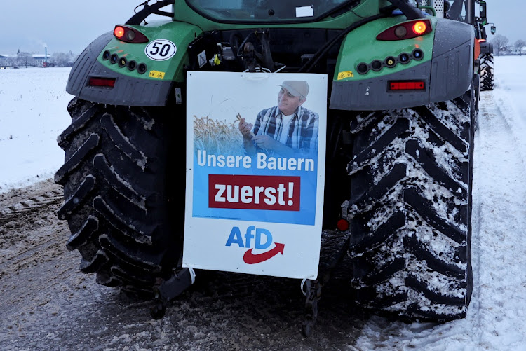 A sign of the Alternative for Germany party (AfD) that reads "Our farmers first" is hanged on a farm vehiclein Taufkirchen near Munich, Germany. File photo: LEO SIMON/REUTERS