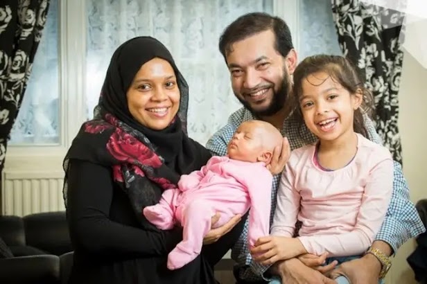 Afia Ahmed, with daughter Aleeza and husband Raquib.