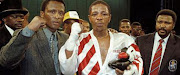 Promoter David Faas, left, celebrates with his former No1 pro boxer Mzonke Fana.