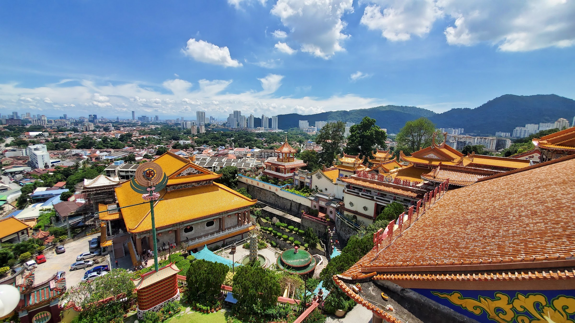 Visiting Kek Lok Si: What makes it unique is that among its millions of Buddhas it shows the blending of cultures that is so representative of Malaysia by including many stylistic representations of Buddha.