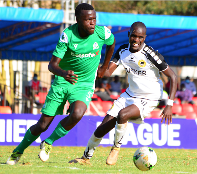 Gor Mahia’s Kelvin Wesonga (L) contests for the ball with Boniface Muchiri of Tusker during their Premier League match at Moi Stadium, Kasarani.