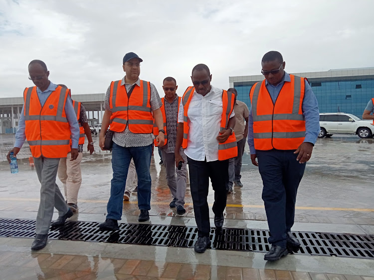 Lapsset director general Stephen Ikua (in white shirt) and Lamu Port general manager Vincent Sidai with a delegation from Qatar at the Lamu port on Thursday.