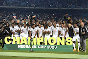 Orlando Pirates players celebrate winning the Nedbank Cup after the final against Sekhukhune United at Loftus Versfeld on March 27 2023.