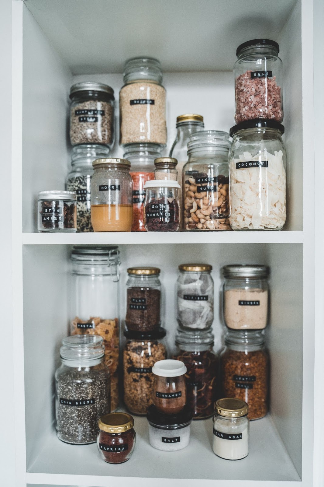 labeled and shelved canning or mason jars in a pantry - DIY Farmhouse Kitchen Decor And Design Ideas 
