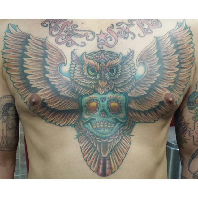 colorful owl tattoo