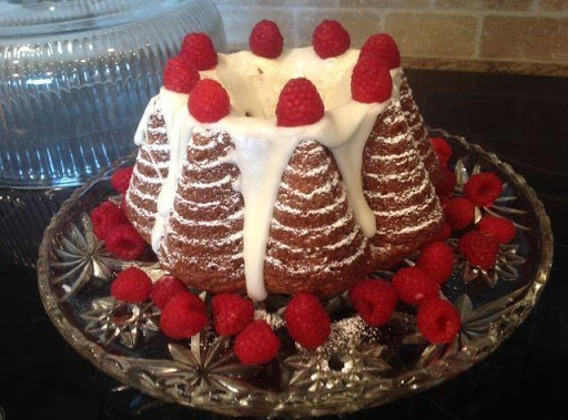 This Raspberry Coffee Cake recipe has been in my collection since 1970. This cake gets better as it sits on the counter in a pretty glass dome. It isn't rich so can be dressed up with whipped creme, glaze, or sauce. 