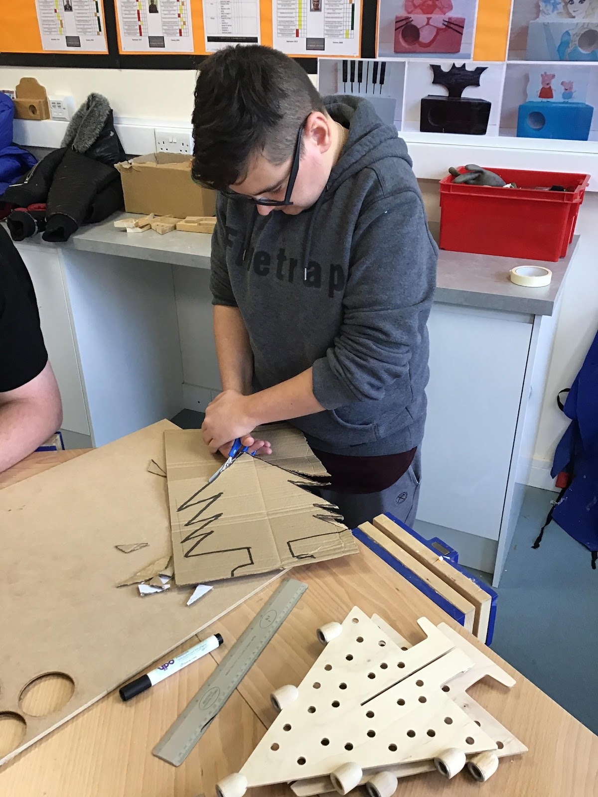 Students making Christmas products to sell. 