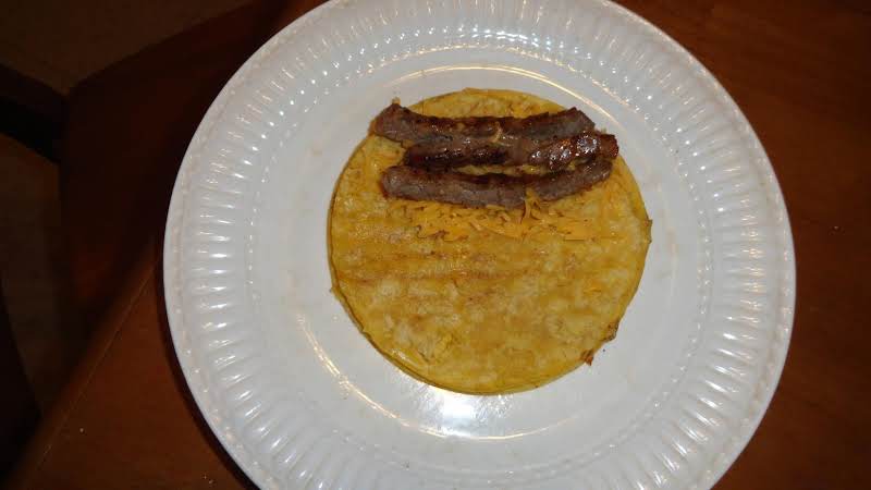 Add Meat (or Chili) And Cheese On One Side Of Softened Tortilla