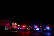 Police officers and police vehicles are seen following a shooting at a church in Sacramento, California, US, February 28, 2022. 