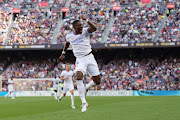 Real Madrid's David Alaba celebrates scoring their first goal.