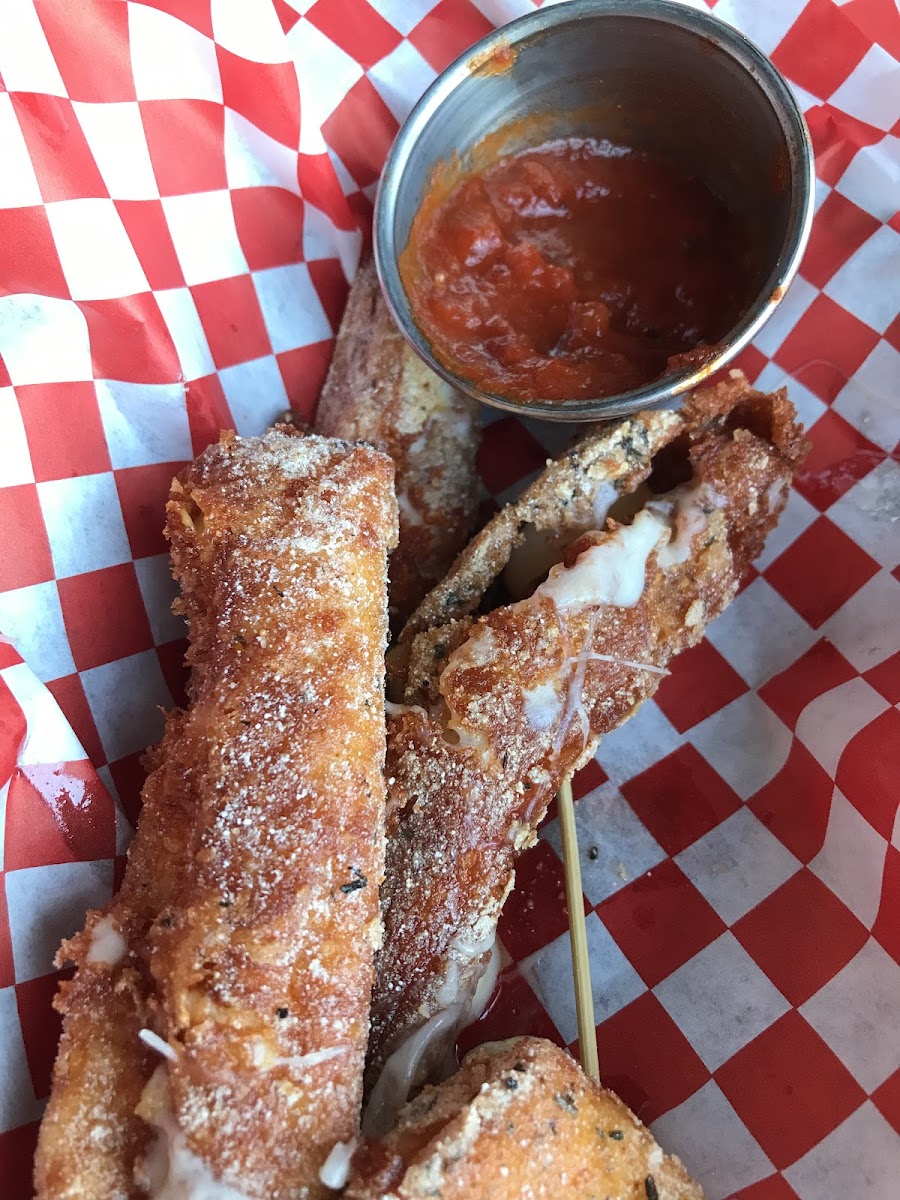 Hand breaded mozzarella sticks