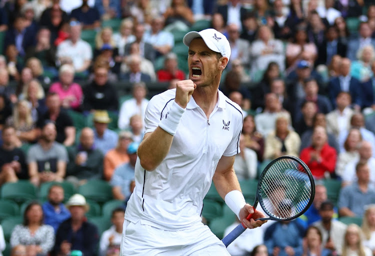 Britain's Andy Murray reacts during his first round match against Australia's James Duckworth at Wimbledon in London, Britain on June 27, 2022