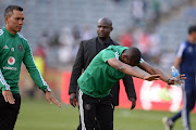 Orlando Pirates coach Rhulani Mokwena and assistant coach Fadlu Davids after the Absa Premiership match between Orlando Pirates and Cape Town City FC at Orlando Stadium on September 28, 2019 in Johannesburg, South Africa. 