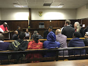 Estina Dairy Farm accused Ashu Chawla, Nazeem Howa, Ronica Ragovan, Peter Thabetha, Verun Gupta (Gupta brothers nephew) and one other await in the dock for proceedings to begin at their corruption trial in Bloemfontein Magistrates Court. 15 February 2018 