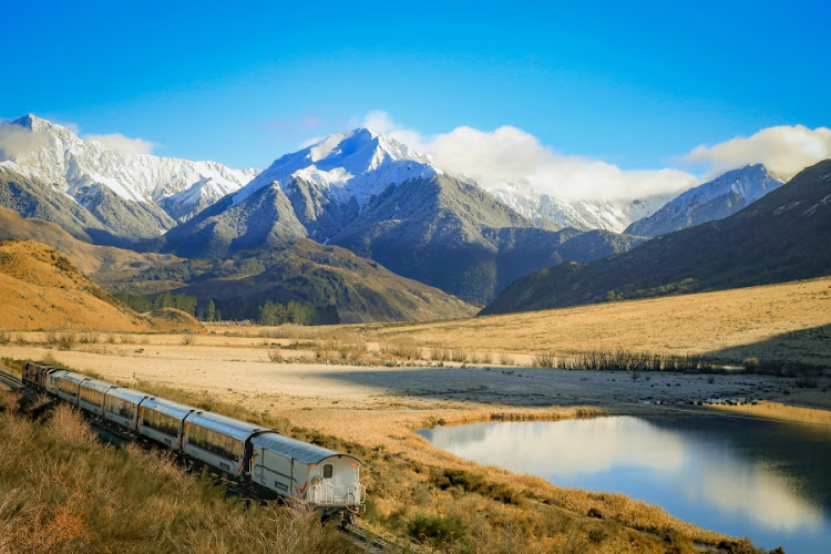 New Zealand's TranzAlpine train has been described as one of the great train journeys of the world. Here it passes Lake Sarah on its 224km-long journey.