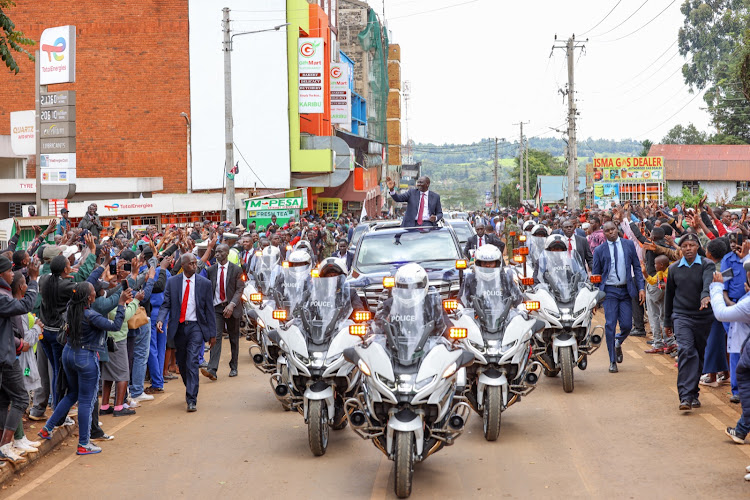 President William Ruto convoy in Kericho town as he waves at Kericho residents after the Mashujaa celebrations on October 20, 2023